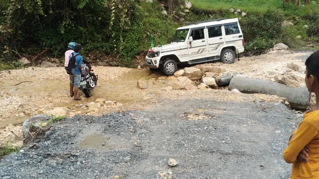 Flooded road in Bageshwar district after heavy monsoon rain